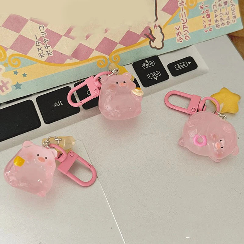 Pink pig charm that lights in the dark