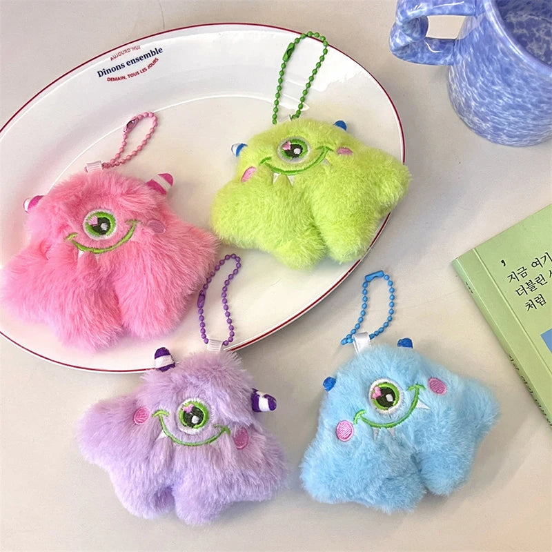 Plush little monster charm