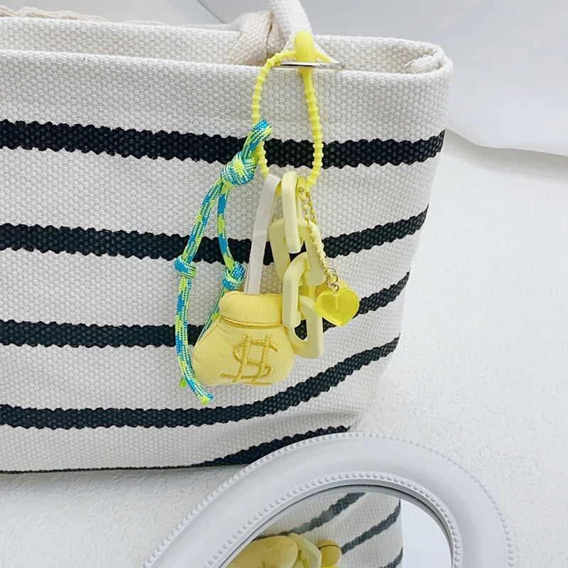 Money bag with goldfish/chain charm