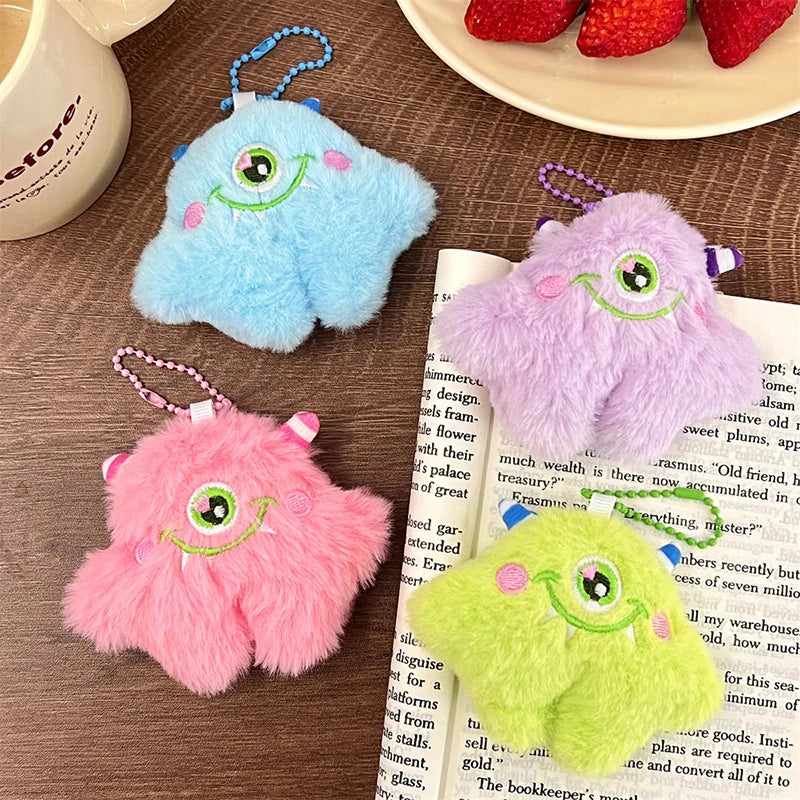 Plush little monster charm