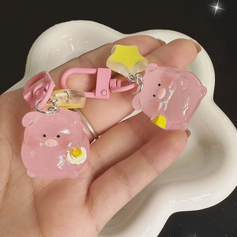 Pink pig charm that lights in the dark