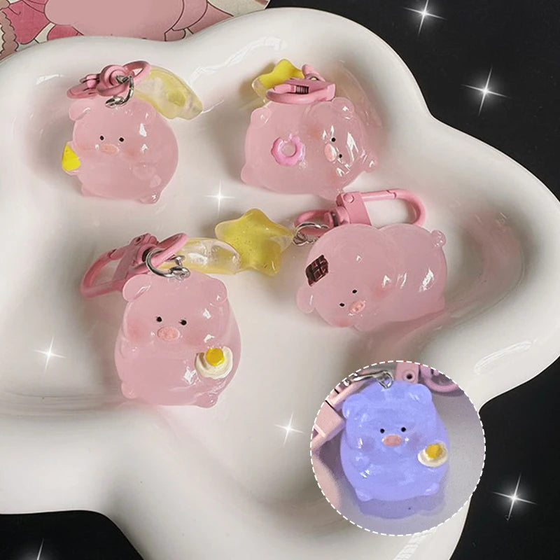 Pink pig charm that lights in the dark