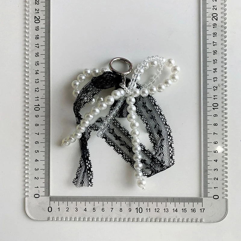 Pearl & lace bow charm