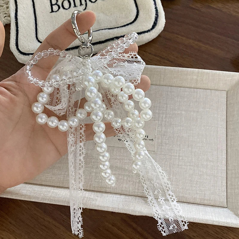 Pearl & lace bow charm