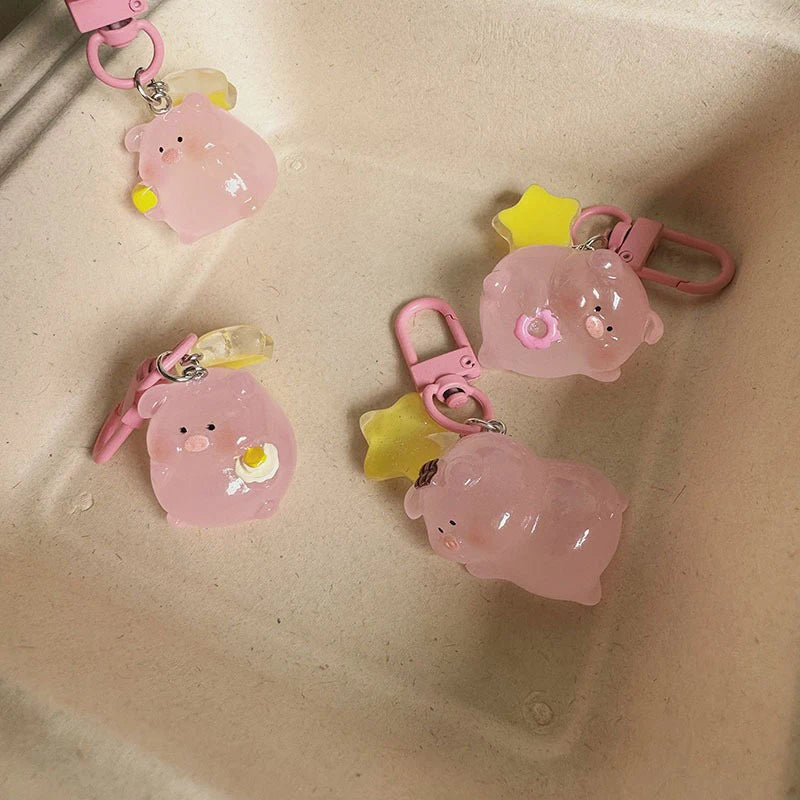 Pink pig charm that lights in the dark