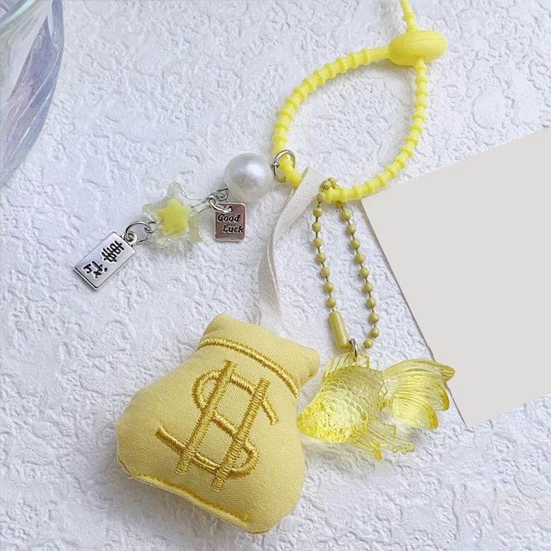 Money bag with goldfish/chain charm