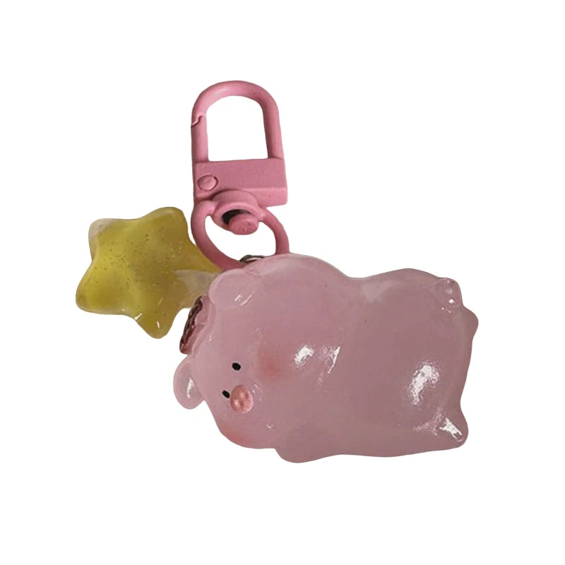 Pink pig charm that lights in the dark